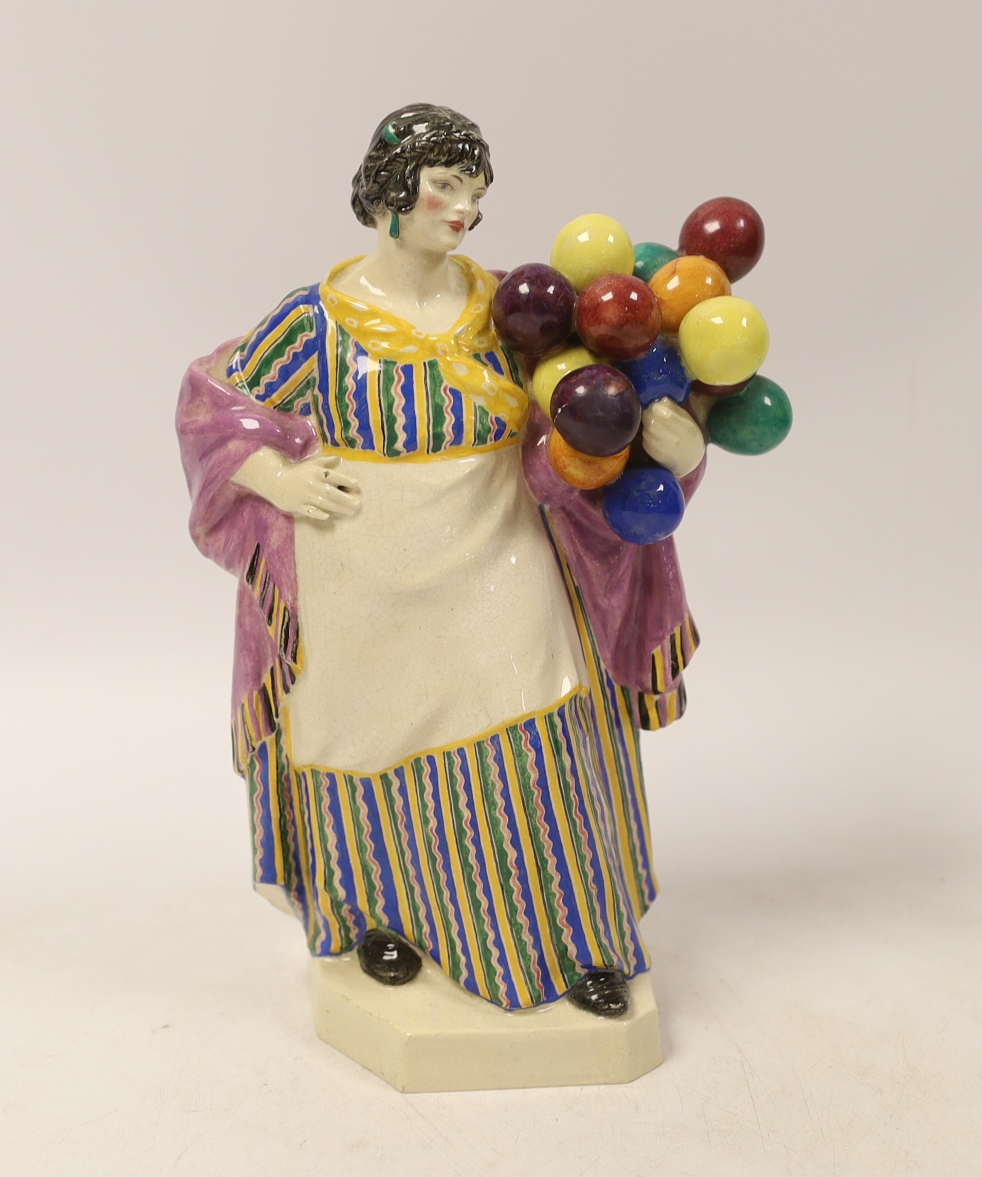 A Charles Vyse glazed model the balloon lady, dated 1921, 22cm high (a.f.)